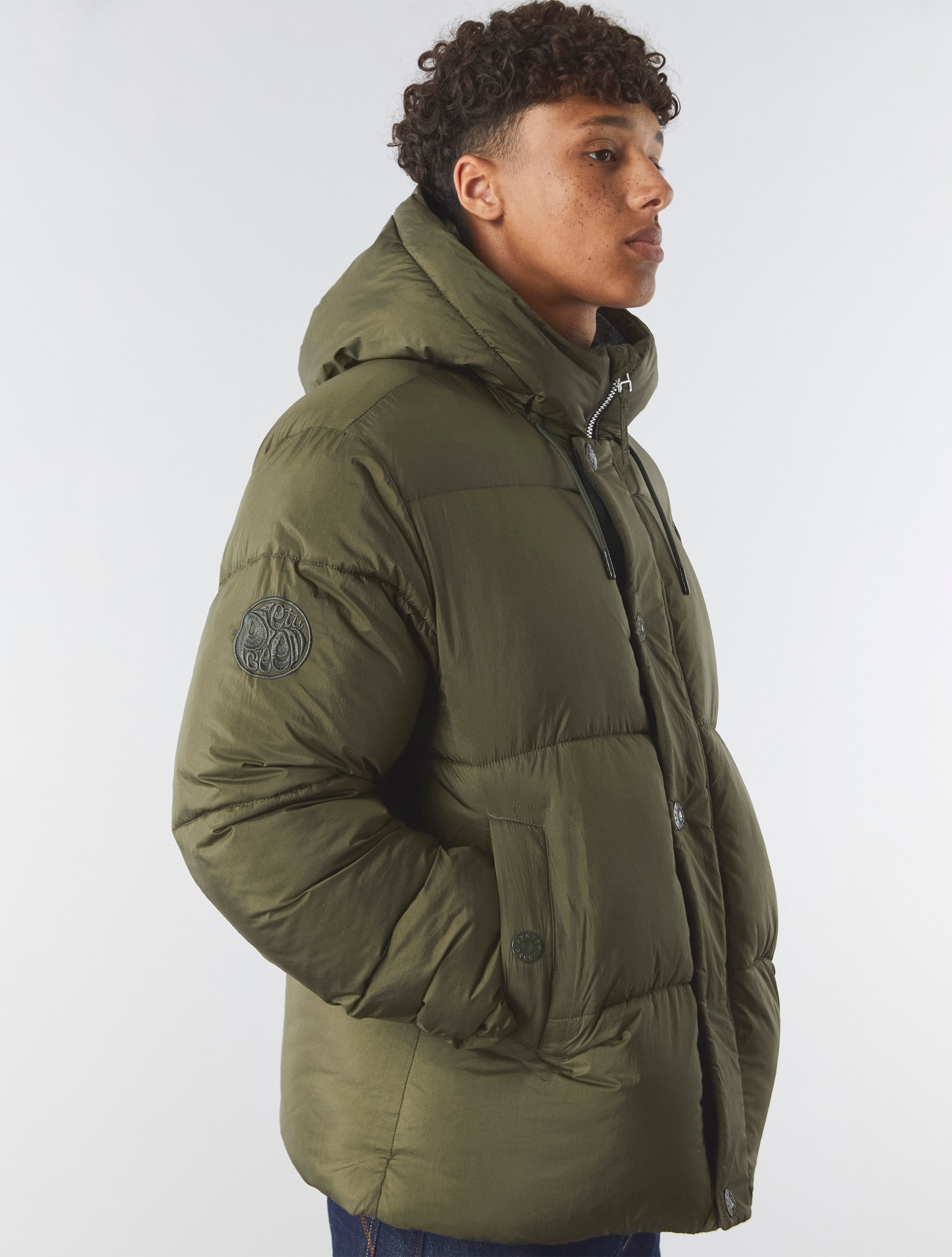 Pretty green puffer coat deals